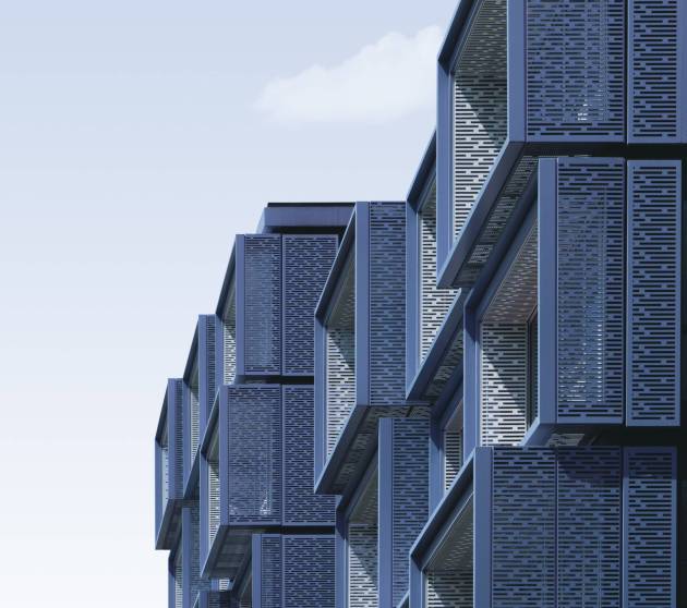 A vertical shot of blue metal cubical structures under the blue sky